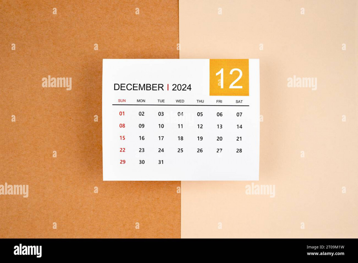 December calendar page on yellow background Stock Photo Alamy
