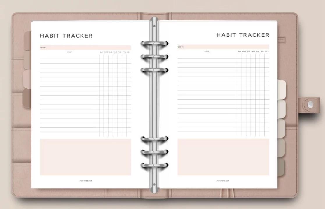daily habit tracker planner may 2026 on desk with pen